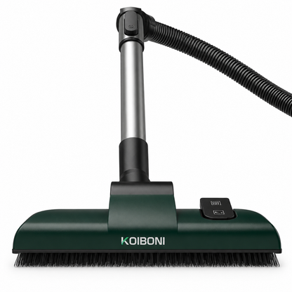 KOIBONI CleanGuard S1 bagged cylinder vacuum cleaner with hose and attachments on a tiled floor.